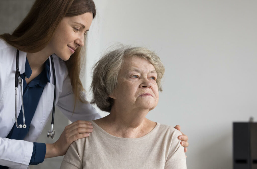 A doctor attempts to comfort a senior with a new dementia diagnosis they’re resisting